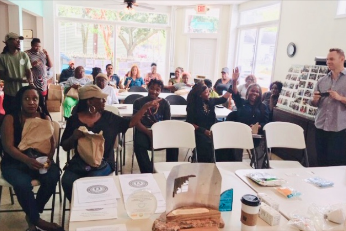 Community members in Charleston, SC, gather to discuss sustainability ideas.