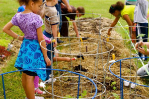 Kids in a community garden