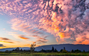 A photo of a sunrise sky over mountains for SSDN members Tennessee