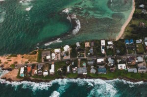 An aerial photo of coastal residences and businesses threatened by climate change in Florida.