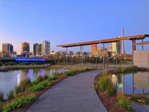 Park and water feature with town in background